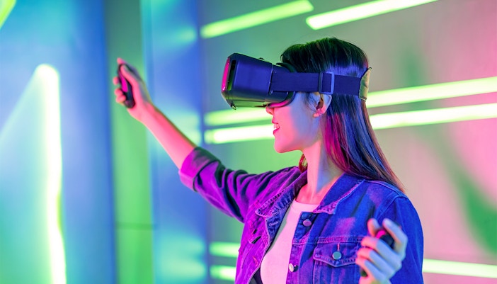 Gardens by the Bay indoor waterfall in Singapore, showcasing lush greenery and vibrant floral displays.