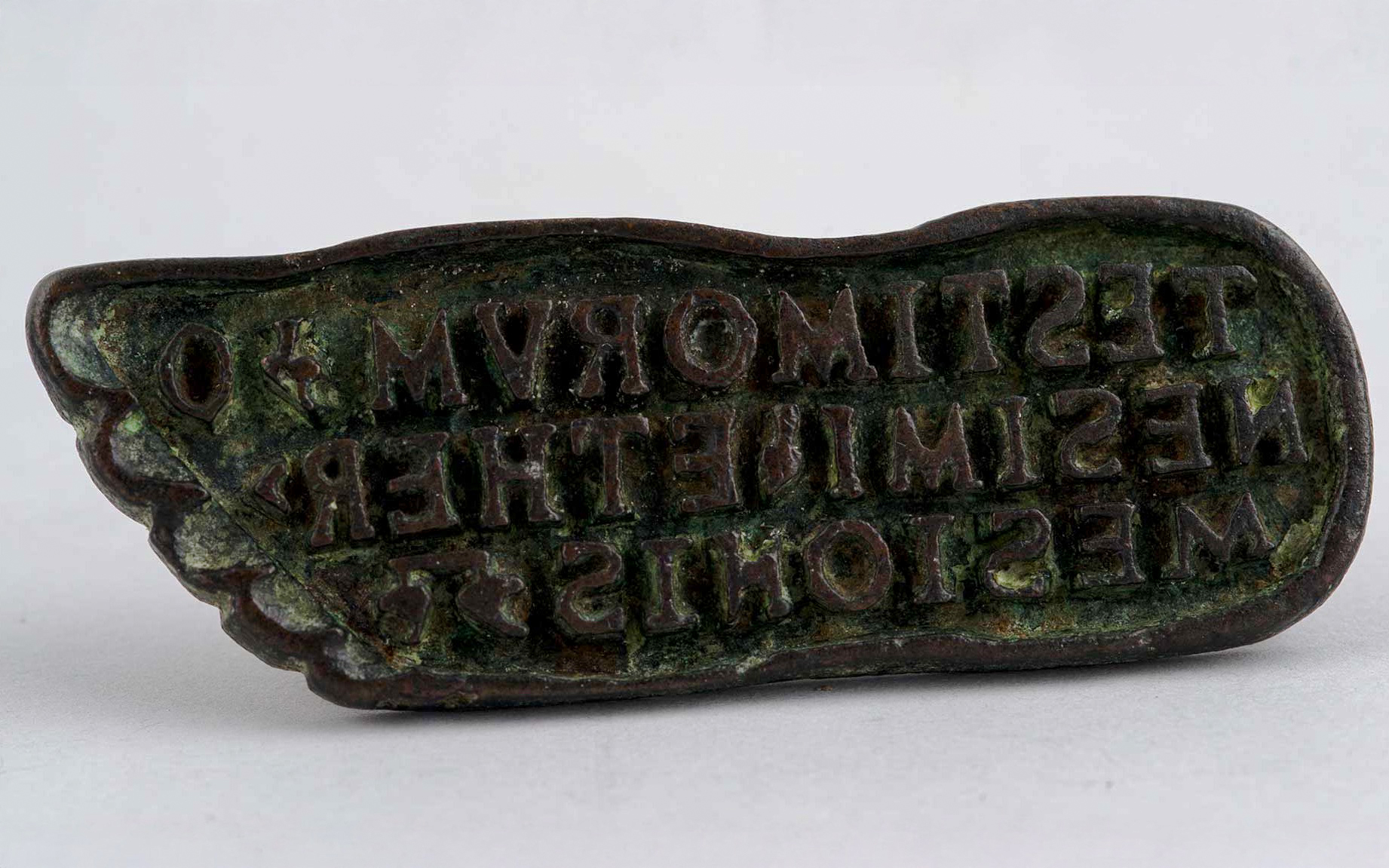 Bronze bread stamp with inscriptions, Roman or Byzantine era.