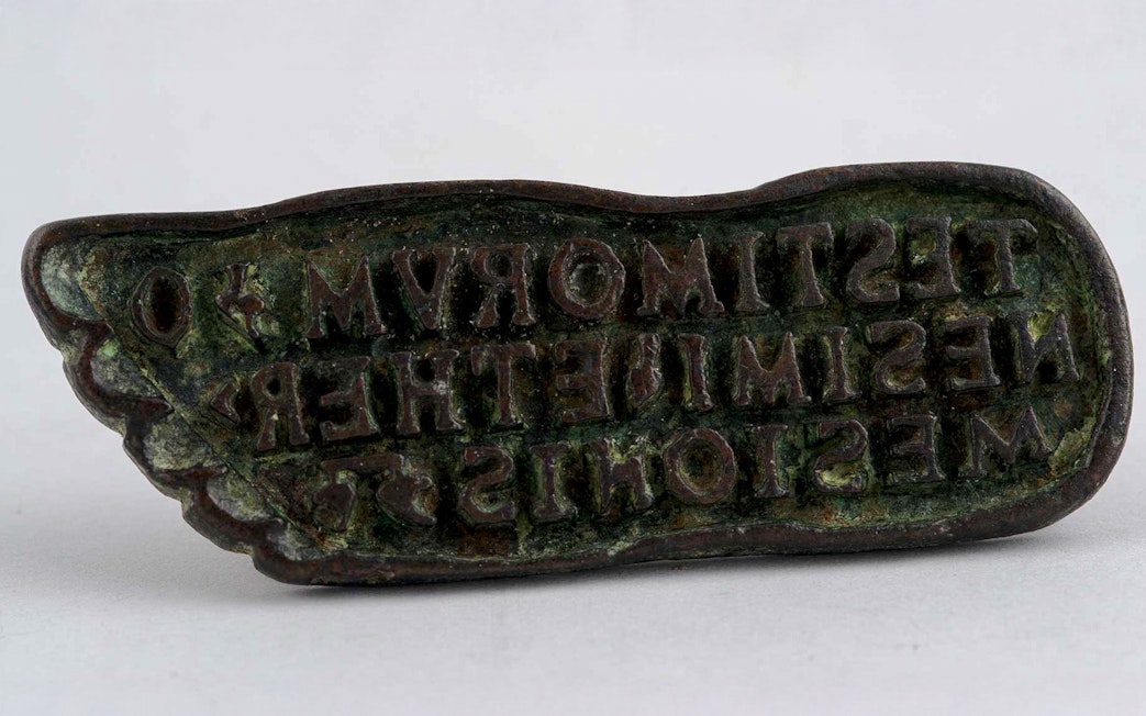 Bronze bread stamp with inscriptions, Roman or Byzantine era.