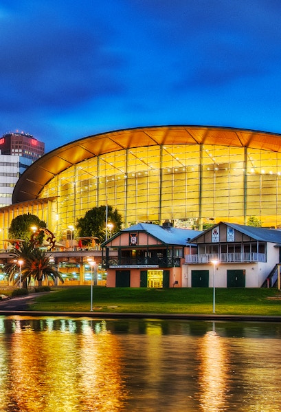 Adelaide Oval illuminated at night, reflecting on the river, South Australia.