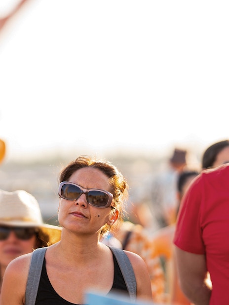 Tour group observing the Changing of the Guard near Westminster Abbey, London.