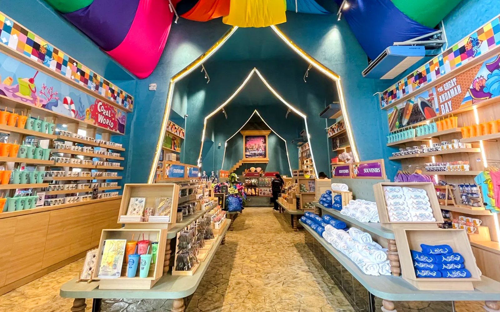 Souvenir shop interior at Andamanda Phuket Water Park with colorful merchandise displays.