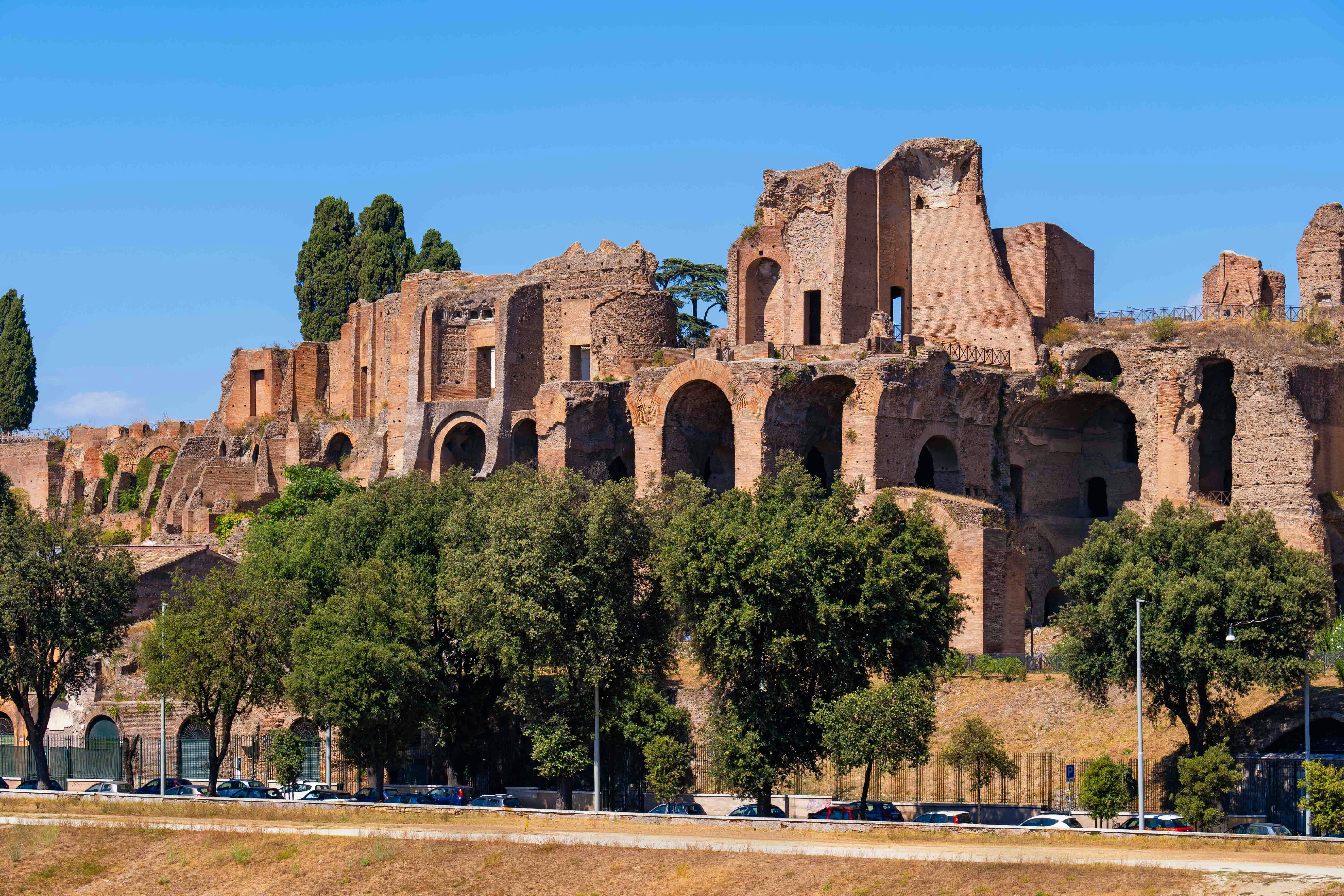 Temple of Apollo Palatinus ruins in Rome with ancient columns and historical site backdrop