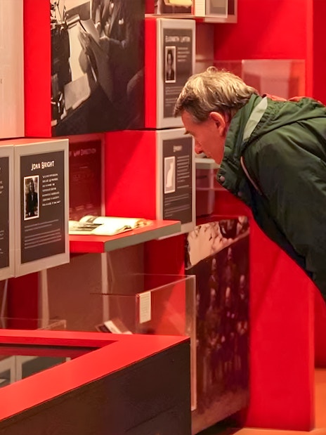 Visitors examining exhibits at Churchill's War Rooms in Westminster.