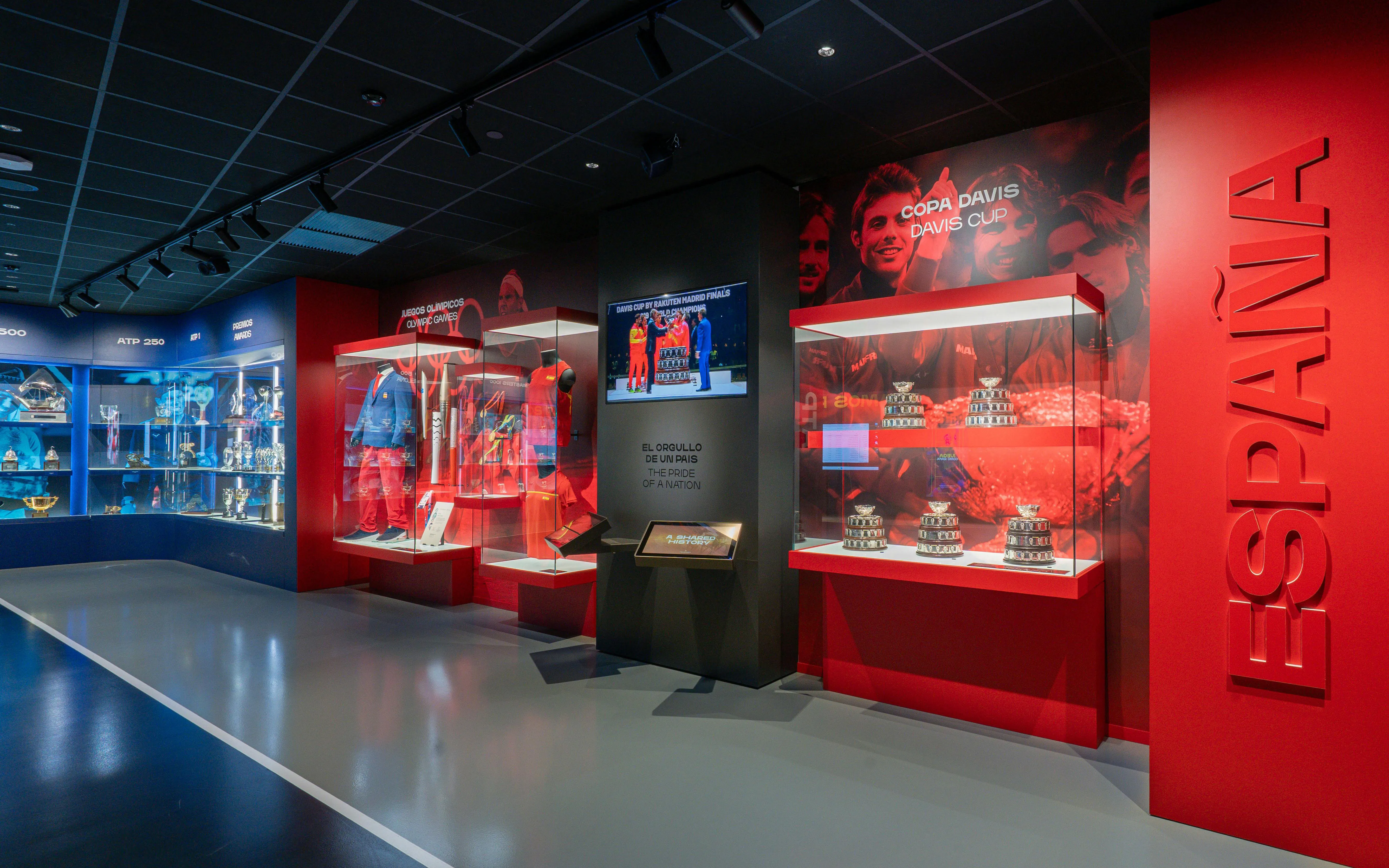 Rafa Nadal Museum exhibit featuring tennis trophies and memorabilia.