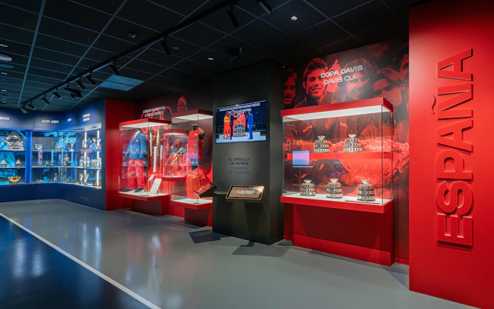Rafa Nadal Museum exhibit featuring tennis trophies and memorabilia.