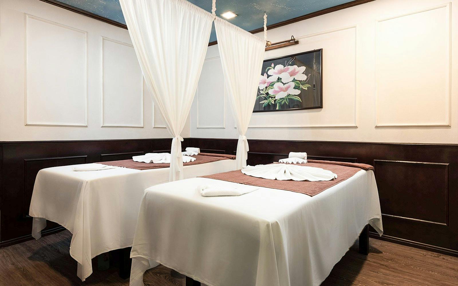 Spa treatment room with two massage tables on Amanda Luxury Cruise.