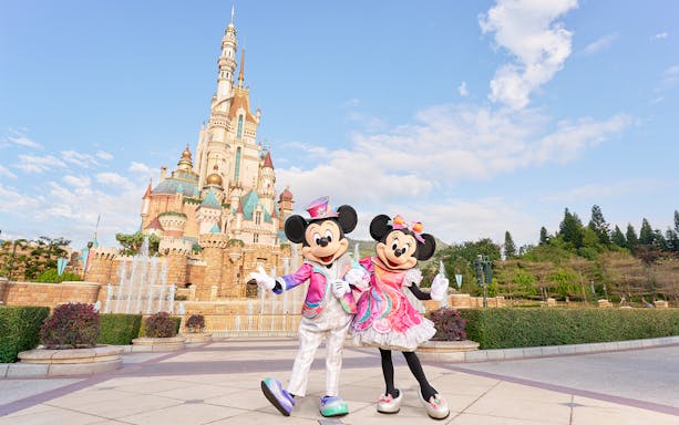 Mickey and Minnie Mouse greeting visitors at Disneyland Hong Kong.
