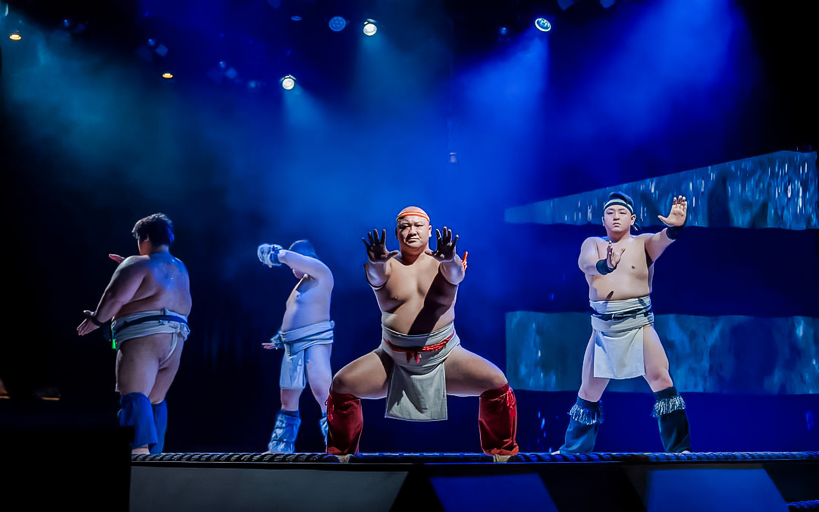 Sumo wrestlers performing at The Sumo Hall Hirakuza in Osaka.