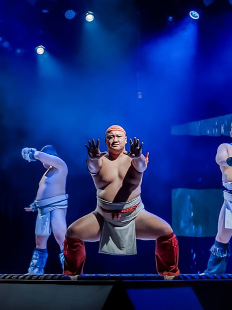 Sumo wrestlers performing at The Sumo Hall Hirakuza in Osaka.