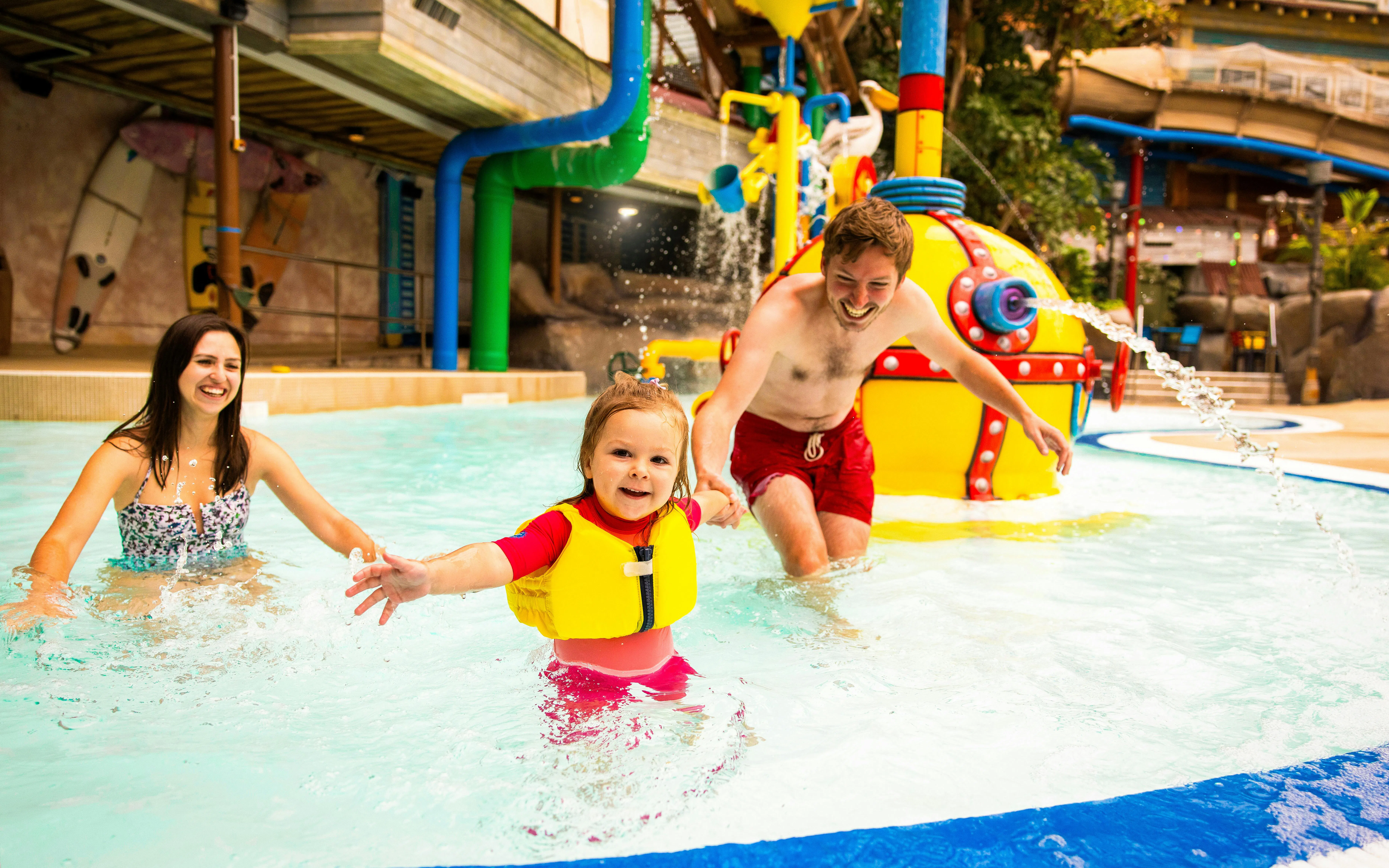 Family enjoying the splash pool at Alton Towers Waterpark.