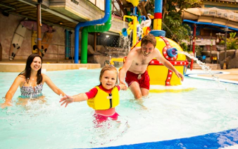 Family enjoying the splash pool at Alton Towers Waterpark.
