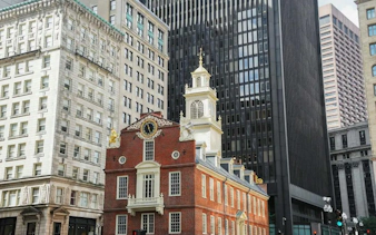 Old State House surrounded by modern buildings, Boston Greenway exploration game.