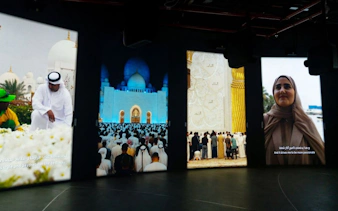 Visitors viewing exhibits at Light & Peace Museum, Sheikh Zayed Grand Mosque Centre.