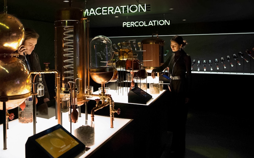 Bols Cocktail Experience interactive exhibit with distillation equipment in Amsterdam.