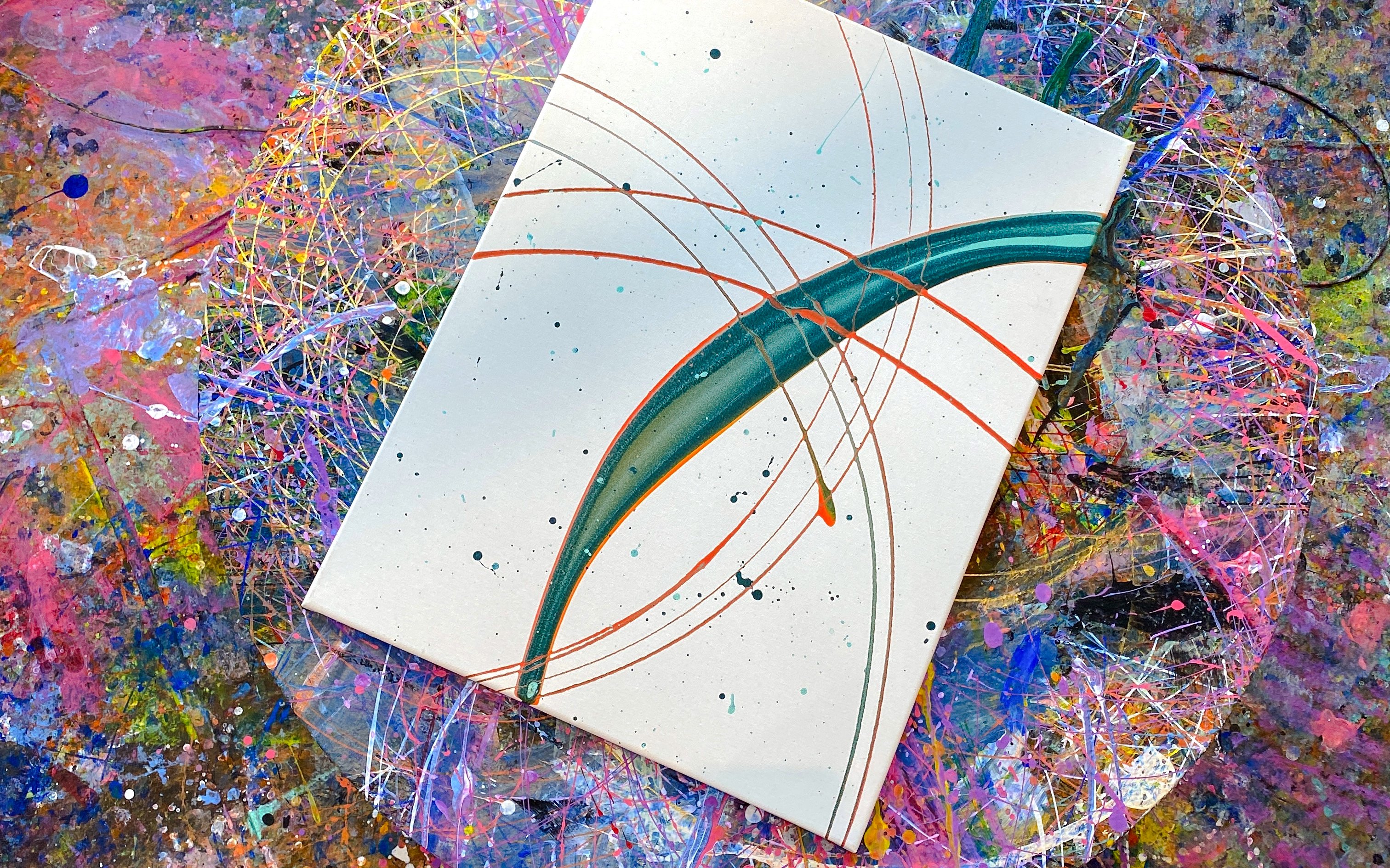 Abstract artwork with colorful splatters and lines at Motion Art Space, Singapore.