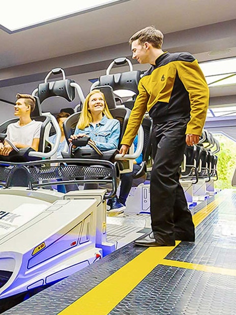 Guests boarding Star Trek: Operation Enterprise ride at Movie Park.