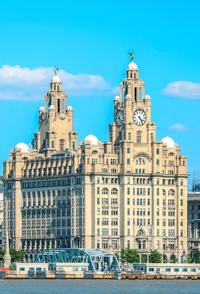 Royal Liver Building with clock towers in Liverpool, UK, viewed from the waterfront.