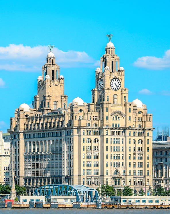 Royal Liver Building with clock towers in Liverpool, UK, viewed from the waterfront.