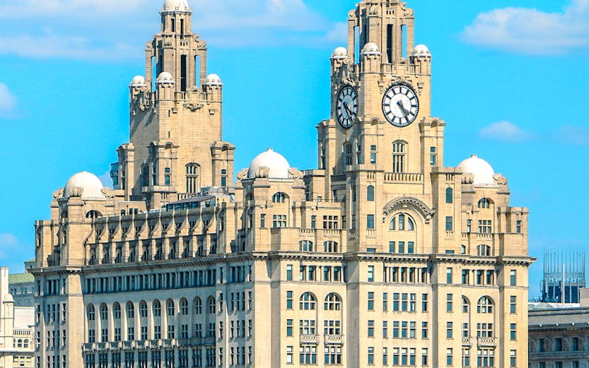 Royal Liver Building with clock towers in Liverpool, UK, viewed from the waterfront.