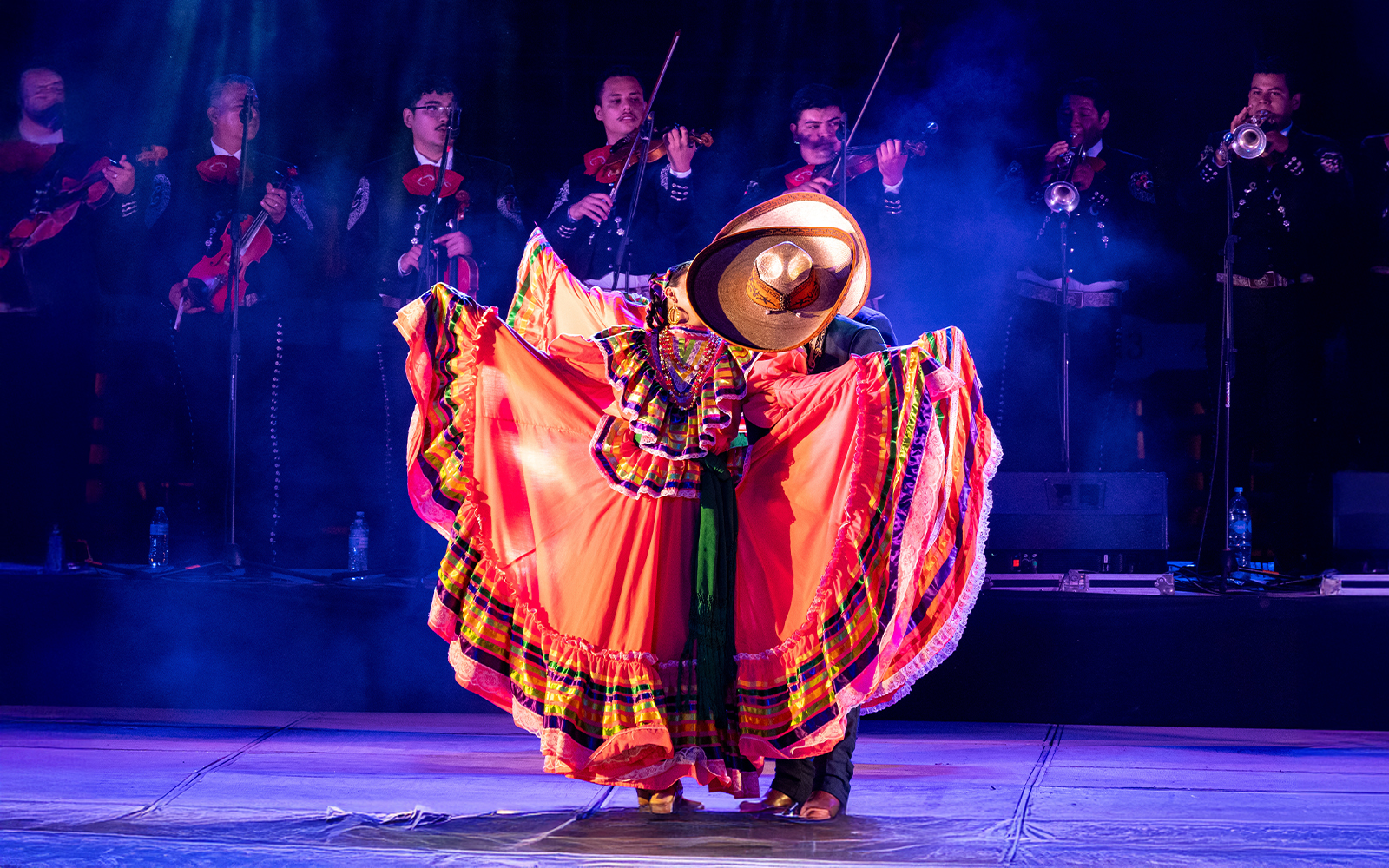 Ballet Folklórico dancers performing traditional Mexican dance in vibrant costumes, Mexico City.
