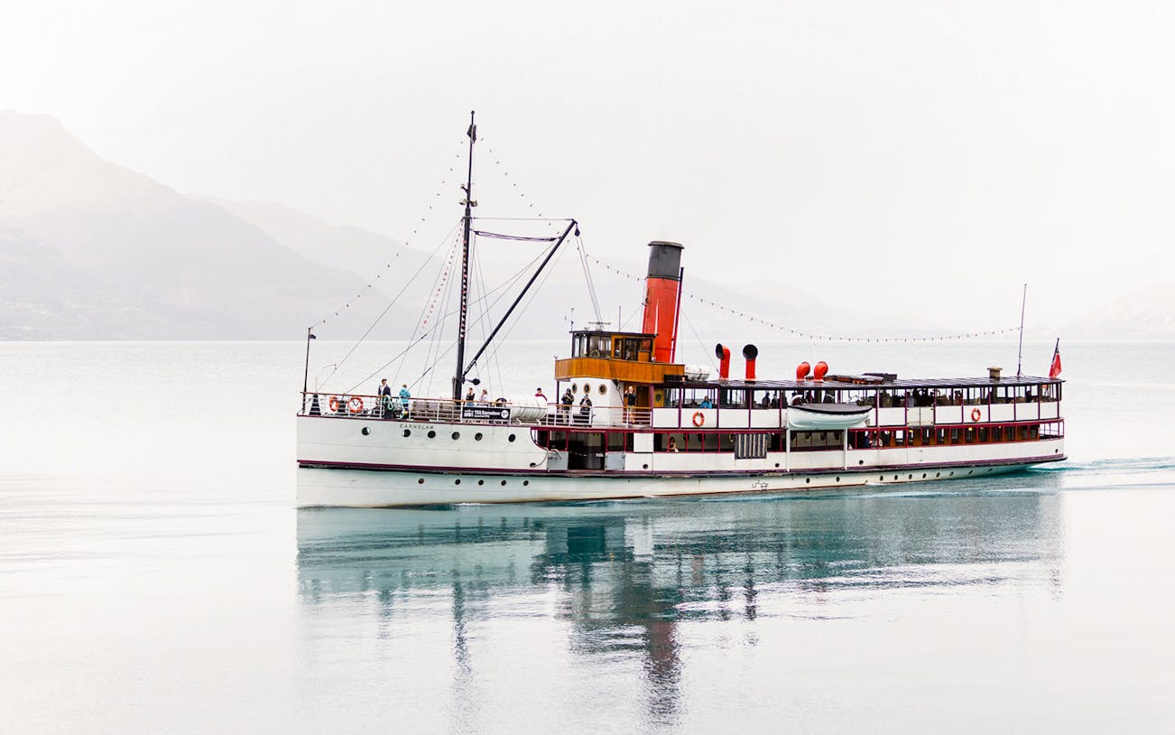 Steamboat cruising on Lake Wakatipu, New Zealand.