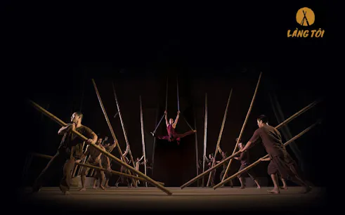 Performers with bamboo poles in Lang Toi - My Village Show, Hanoi.