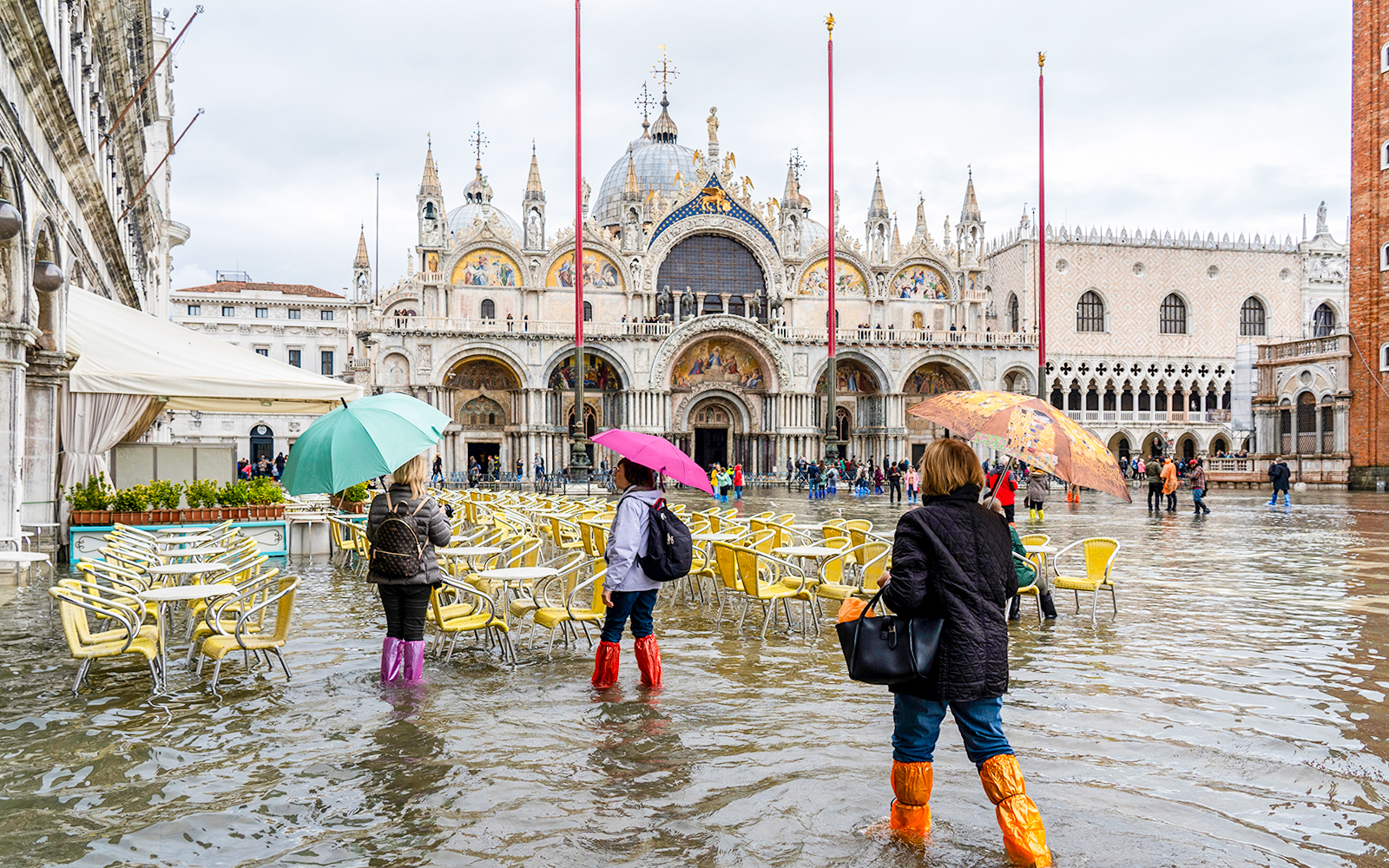 Flooded St. Mark's Square during acqua alta in Venice, Italy.