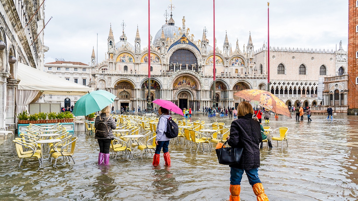 Flooded St. Mark's Square during acqua alta in Venice, Italy.