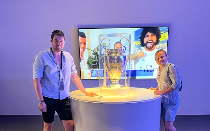 Champions League trophy display at Santiago Bernabeu Stadium.