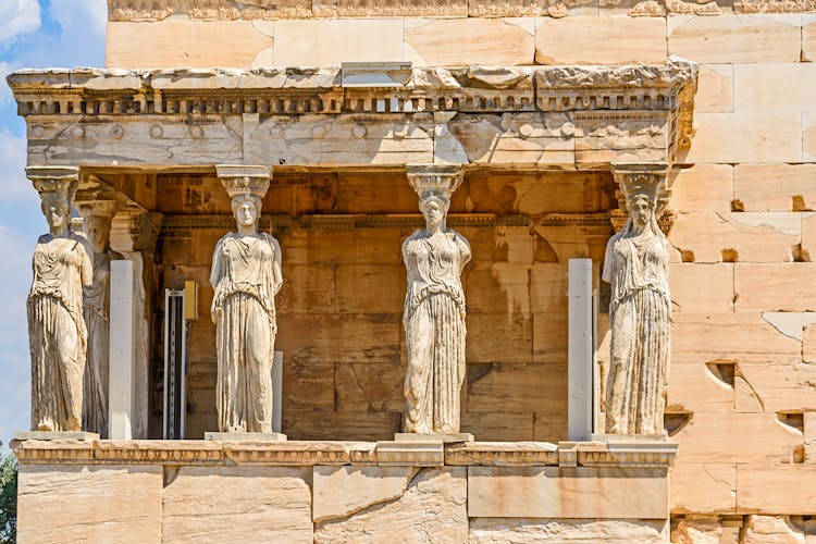 Erechtheion columns shaped like elegant women on the Acropolis in Athens, Greece.
