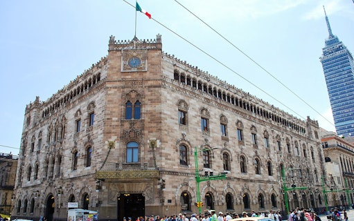 Historic Postal Palace in Mexico City with Torre Latinoamericana in the background.