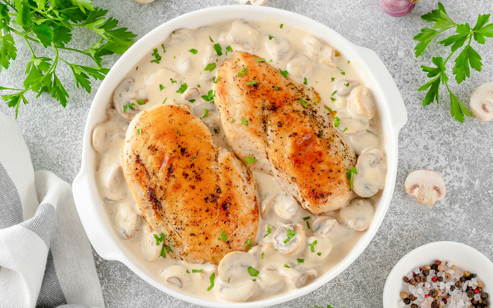 Chicken with wild mushroom fricassée in creamy sauce, Paris.