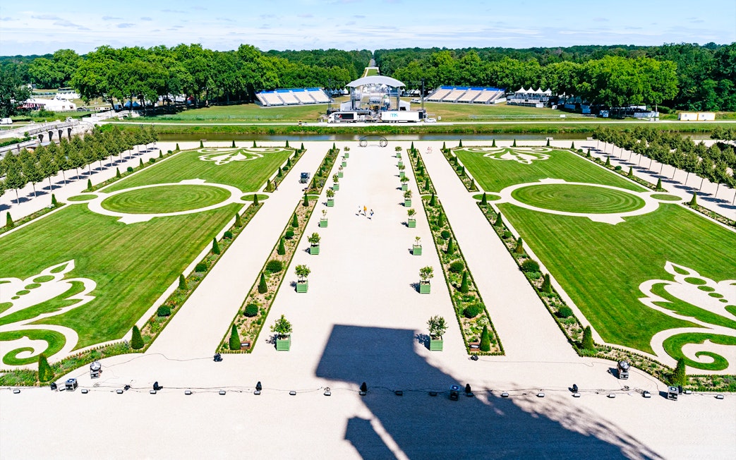 Chambord Castle gardens with symmetrical lawns and decorative patterns, France.