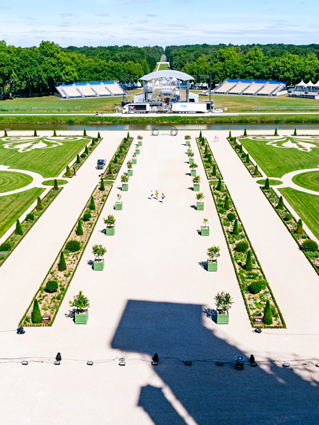 Chambord Castle gardens with symmetrical lawns and decorative patterns, France.