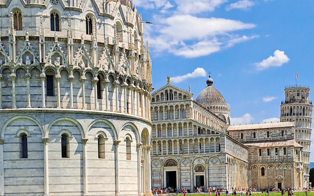 Pisa Cathedral and Leaning Tower on a sunny day during a guided walking tour.