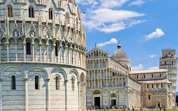 Pisa Cathedral and Leaning Tower on a sunny day during a guided walking tour.