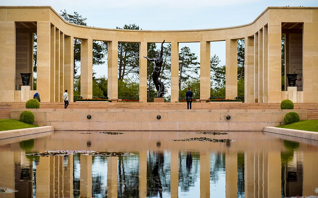 Normandy American Cemetery memorial with reflecting pool on D-Day beaches day trip.