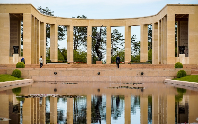 Normandy American Cemetery memorial with reflecting pool on D-Day beaches day trip.