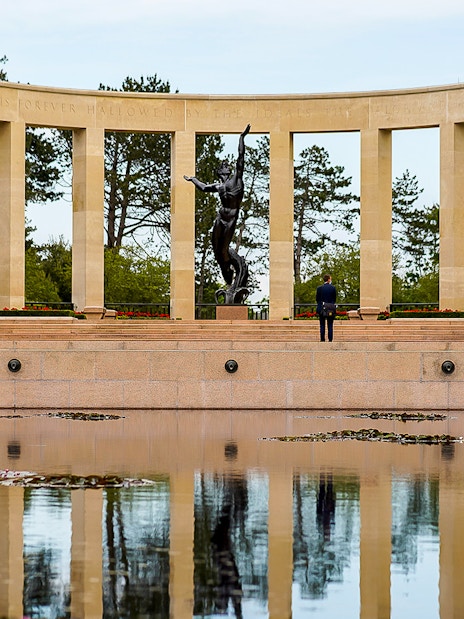 Normandy American Cemetery memorial with reflecting pool on D-Day beaches day trip.