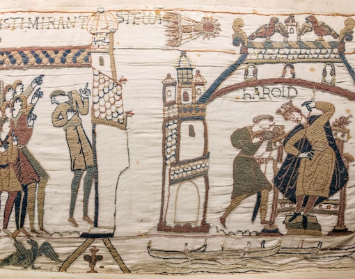 Bayeux Tapestry depicting historical scenes in Bayeux, France.