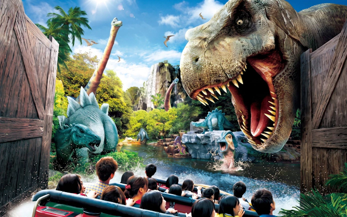 Visitors on a boat ride encounter dinosaurs at Jurassic Park: The Ride, Universal Studios Japan.