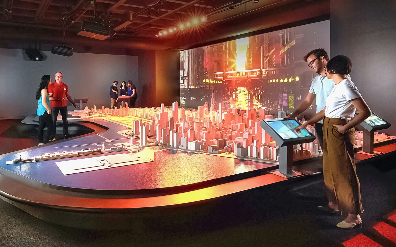 Guests exploring Chicago city model at the Chicago Architectural Center.