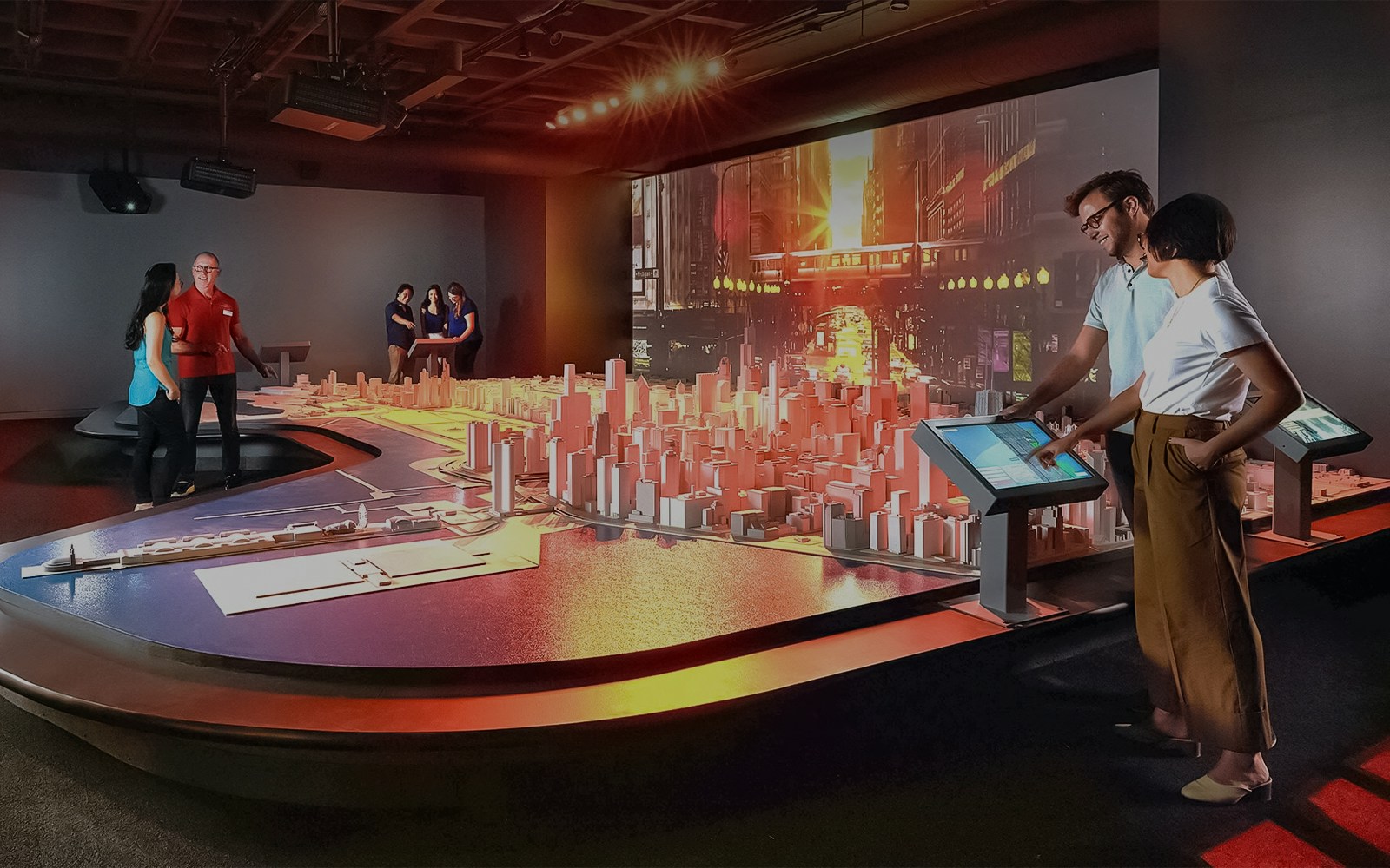 Guests exploring Chicago city model at the Chicago Architectural Center.