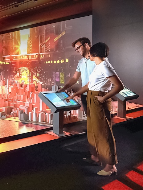 Guests exploring Chicago city model at the Chicago Architectural Center.