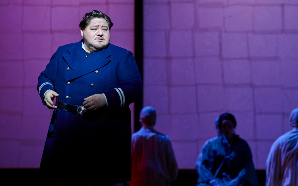 Stage performance of Madama Butterfly in Sydney with a performer in a navy coat.