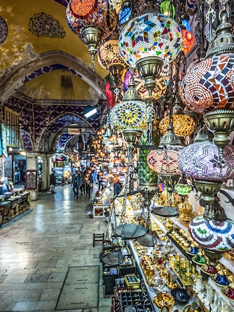 Colorful lamps and shops in Istanbul's Grand Bazaar during a guided tour of the Old City.