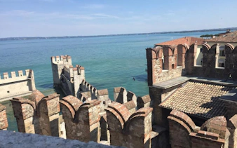 Scaliger Castle overlooking Lake Garda in Sirmione, Italy.