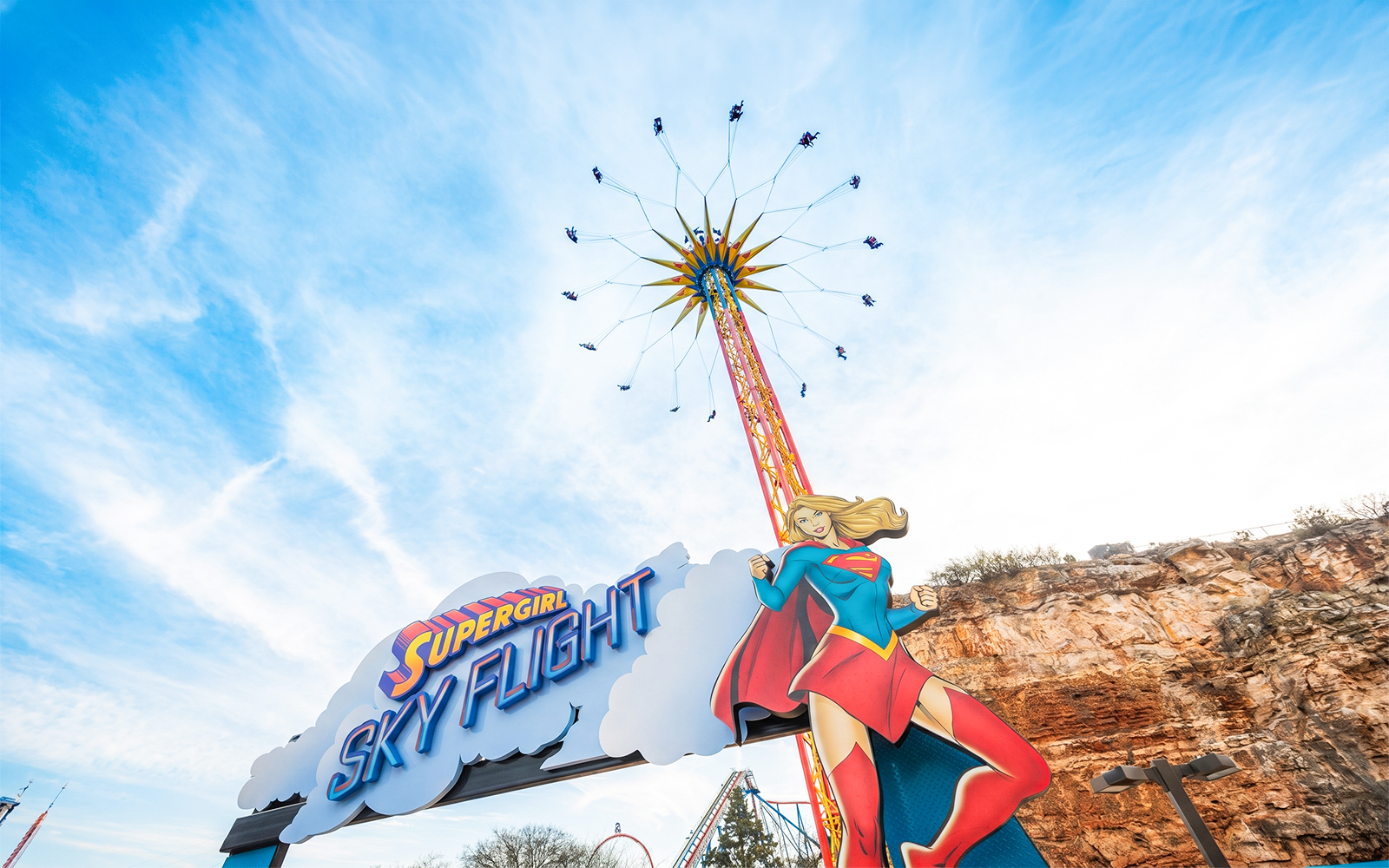 Six Flags Fiesta Texas SUPERGIRL™ Sky Flight ride with towering swing attraction.