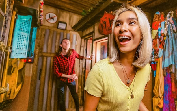 Visitors enjoying an interactive experience in San Francisco attraction.